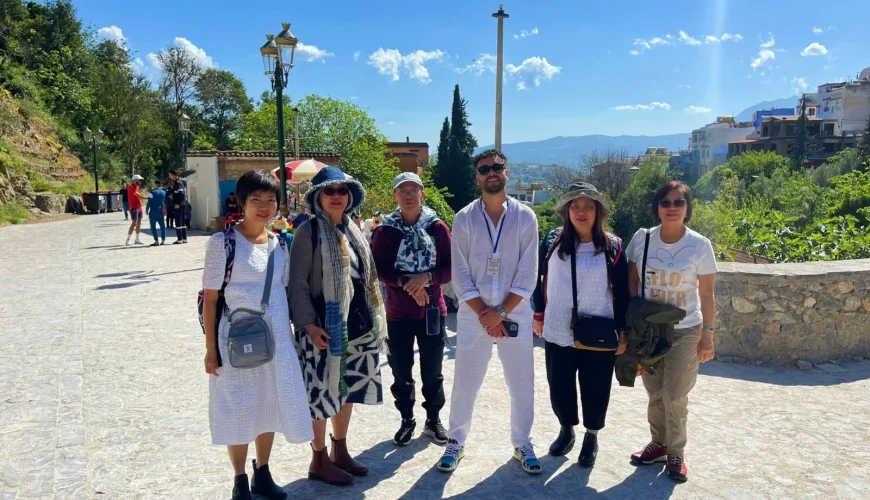 Discovering Chefchaouen’s Blue City on a 12-Day Private Morocco Tour with Moroccan Odyssey Chefchaouen, known worldwide as the Blue City of Morocco, is one of the most charming and photogenic destinations in the country. Nestled in the Rif Mountains, this peaceful town attracts travelers looking for culture, beauty, and authentic Moroccan experiences. During their 12-day private Morocco tour, our guests — a sisters’ family from Singapore — enjoyed a guided visit through the blue streets of Chefchaouen with Moroccan Odyssey. This picture captures a special moment of their journey: smiling faces, relaxed energy, and the joy of discovering one of Morocco’s most iconic cities with a local professional tour guide. Walking through the narrow blue-painted alleys, the family explored traditional neighborhoods, small artisan shops, and scenic viewpoints overlooking the old medina. Why Chefchaouen Is a Highlight of a Private Morocco Tour Chefchaouen is famous for its blue-washed walls, Andalusian architecture, and calm atmosphere. Unlike busy imperial cities, the Blue City offers a slower pace, making it ideal for families, sisters traveling together, and private tours. With Moroccan Odyssey, guests benefit from a customized itinerary, allowing enough time to enjoy photography, local culture, and authentic interactions. During this visit, our guide shared stories about the city’s history, its Andalusian roots, and daily life in northern Morocco. The sisters and their family enjoyed exploring at their own rhythm, which is one of the biggest advantages of choosing a 12-day private tour package in Morocco. A 12-Day Morocco Tour Designed for Comfort and Authenticity This Chefchaouen experience was part of a 12-day private Morocco tour package, carefully designed by Moroccan Odyssey to combine comfort, culture, and unforgettable memories. From the north to the south of Morocco, guests experience imperial cities, mountain landscapes, desert adventures, and charming towns like Chefchaouen. As seen in the picture, the sisters’ family felt relaxed and connected, enjoying a stress-free journey with a trusted Moroccan travel agency, private transportation, and an experienced English-speaking guide. Why Choose Moroccan Odyssey Moroccan Odyssey specializes in private Morocco tours, offering personalized service for families, couples, and small groups from around the world, including travelers from Singapore and Southeast Asia. Every tour is designed with care, flexibility, and attention to detail, ensuring guests enjoy Morocco in a meaningful and comfortable way.