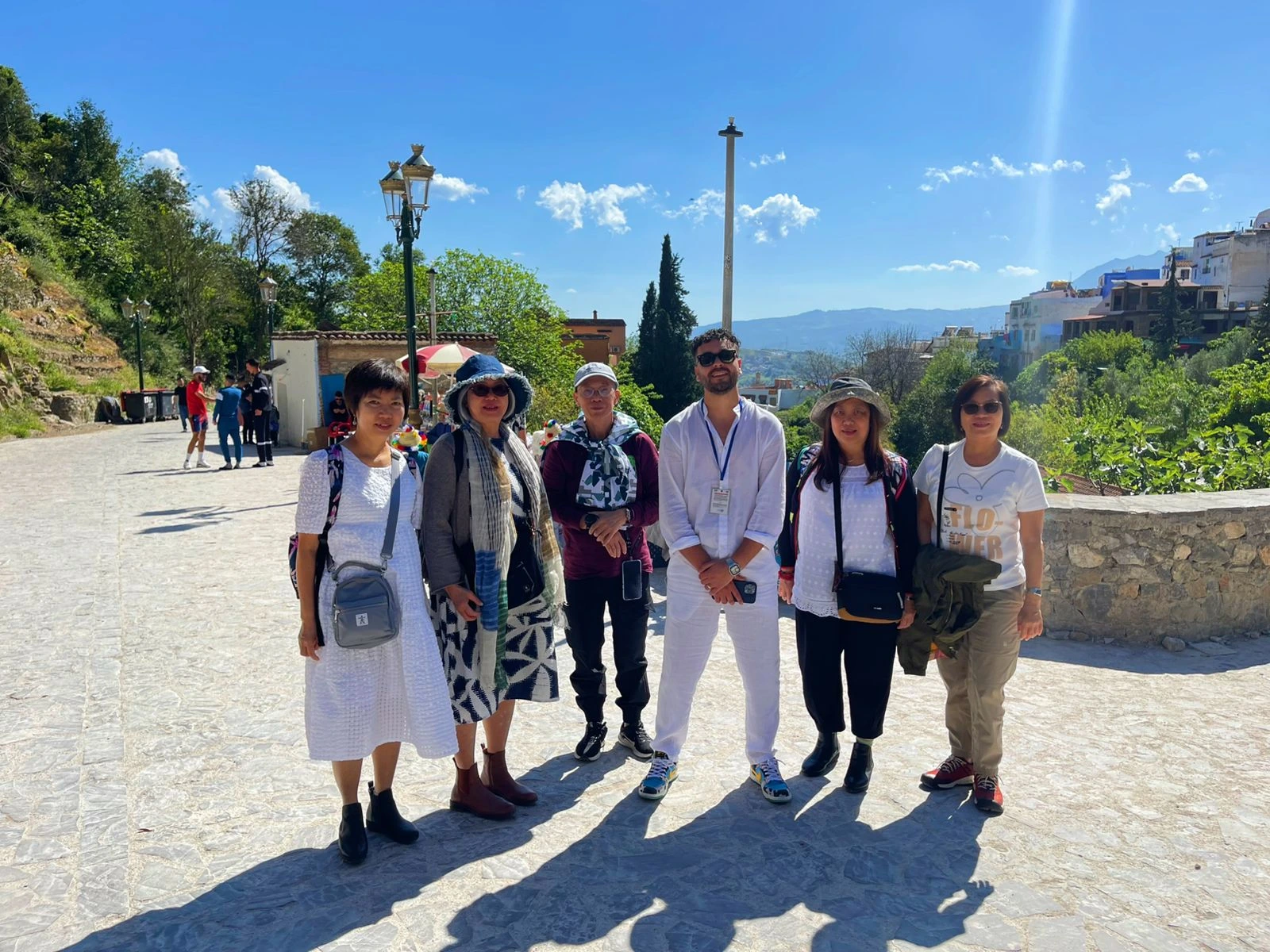 Discovering Chefchaouen’s Blue City on a 12-Day Private Morocco Tour with Moroccan Odyssey Chefchaouen, known worldwide as the Blue City of Morocco, is one of the most charming and photogenic destinations in the country. Nestled in the Rif Mountains, this peaceful town attracts travelers looking for culture, beauty, and authentic Moroccan experiences. During their 12-day private Morocco tour, our guests — a sisters’ family from Singapore — enjoyed a guided visit through the blue streets of Chefchaouen with Moroccan Odyssey. This picture captures a special moment of their journey: smiling faces, relaxed energy, and the joy of discovering one of Morocco’s most iconic cities with a local professional tour guide. Walking through the narrow blue-painted alleys, the family explored traditional neighborhoods, small artisan shops, and scenic viewpoints overlooking the old medina. Why Chefchaouen Is a Highlight of a Private Morocco Tour Chefchaouen is famous for its blue-washed walls, Andalusian architecture, and calm atmosphere. Unlike busy imperial cities, the Blue City offers a slower pace, making it ideal for families, sisters traveling together, and private tours. With Moroccan Odyssey, guests benefit from a customized itinerary, allowing enough time to enjoy photography, local culture, and authentic interactions. During this visit, our guide shared stories about the city’s history, its Andalusian roots, and daily life in northern Morocco. The sisters and their family enjoyed exploring at their own rhythm, which is one of the biggest advantages of choosing a 12-day private tour package in Morocco. A 12-Day Morocco Tour Designed for Comfort and Authenticity This Chefchaouen experience was part of a 12-day private Morocco tour package, carefully designed by Moroccan Odyssey to combine comfort, culture, and unforgettable memories. From the north to the south of Morocco, guests experience imperial cities, mountain landscapes, desert adventures, and charming towns like Chefchaouen. As seen in the picture, the sisters’ family felt relaxed and connected, enjoying a stress-free journey with a trusted Moroccan travel agency, private transportation, and an experienced English-speaking guide. Why Choose Moroccan Odyssey Moroccan Odyssey specializes in private Morocco tours, offering personalized service for families, couples, and small groups from around the world, including travelers from Singapore and Southeast Asia. Every tour is designed with care, flexibility, and attention to detail, ensuring guests enjoy Morocco in a meaningful and comfortable way.