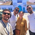 History of Chefchaouen – The Blue Pearl of Morocco Chefchaouen, also known as the Blue City of Morocco, is one of the most charming and peaceful destinations in North Africa. Nestled in the heart of the Rif Mountains, Chefchaouen was founded in 1471 by Moulay Ali Ben Rachid as a small fortress to protect the region from Portuguese invasions. Over the centuries, the city became a refuge for Andalusian and Jewish families fleeing Spain. These communities strongly influenced Chefchaouen’s architecture, culture, and traditions. The iconic blue-painted walls are believed to symbolize spirituality, peace, and protection, while also helping to keep homes cool during summer. Today, Chefchaouen is famous for its relaxed atmosphere, traditional medina, artisanal crafts, and breathtaking mountain scenery. It has become a must-visit destination on any private Morocco tour, especially for travelers seeking authenticity, photography, and cultural immersion. ⸻ ⛰️ The Rif Mountains – A Natural Paradise in Northern Morocco The Rif Mountains form a stunning backdrop to Chefchaouen and play a major role in its unique identity. This green and fertile region is known for its: • Olive groves • Cedar and pine forests • Small Berber villages • Scenic mountain roads Unlike the Atlas Mountains, the Rif offers a softer landscape, ideal for hiking, nature walks, and panoramic viewpoints. Traveling through the Rif Mountains on a private tour with a local driver allows guests to enjoy hidden viewpoints, local markets, and authentic rural life away from mass tourism. Chefchaouen’s location makes it a perfect stop on a 10-day private Morocco itinerary, connecting cities like Tangier, Fes, and Casablanca. Two Australian guests exploring the Blue City of Chefchaouen with a local guide and professional driver during a private 10-day Morocco tour, enjoying the scenic Rif Mountains and an authentic travel experience organized by Moroccan Odyssey. This photo captures two Australian guests enjoying a private Chefchaouen tour in northern Morocco, accompanied by an experienced local guide and a professional private driver. While walking through the iconic blue streets of Chefchaouen, also known as the Blue City of Morocco, the travelers discover the city’s rich history, Andalusian influences, and peaceful atmosphere, all set against the stunning backdrop of the Rif Mountains. This visit is part of a carefully designed 10-day private Morocco tour, offering a personalized travel experience that combines cultural discovery, scenic mountain landscapes, and authentic local encounters. Organized by Moroccan Odyssey, this private tour allows guests to explore Chefchaouen at a relaxed pace, enjoy insightful explanations from a local guide, and travel comfortably through northern Morocco with a dedicated driver, making it an ideal experience for travelers seeking a customized and memorable Morocco travel experience.