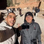 Todra Gorge Tour Morocco – Complete Guide with Local Experience Introduction to Todra Gorge, Morocco Todra Gorge (also called Todra Gorges) is one of the most spectacular natural attractions in southern Morocco. Located near the town of Tinghir, at the edge of the High Atlas Mountains, Todra Gorge is famous for its dramatic limestone canyon walls that rise up to 300 meters high, creating a breathtaking landscape loved by travelers from around the world. A Todra Gorge tour in Morocco is a must for visitors looking for natural beauty, authentic culture, and unforgettable photo opportunities during their Morocco journey. ⸻ Where Is Todra Gorge Located? Todra Gorge is situated in eastern Morocco, approximately: • 170 km from Ouarzazate • 90 km from Merzouga (Sahara Desert) • 15 km from Tinghir It is often included in private Morocco tours between the Sahara Desert, Dades Valley, and Ouarzazate. ⸻ Why Visit Todra Gorge on a Private Tour Choosing a private Todra Gorge tour with a local guide allows you to fully enjoy the site at your own pace. Benefits of a Private Todra Gorge Tour: • Flexible stops for photos and walking • Deeper explanation of local history and geology • Time to explore the palm oasis and Berber villages • Comfortable transport with a private driver • Ideal for families, couples, and small groups With Moroccan Odyssey, our tours focus on real experiences, not rushed visits. ⸻ The Natural Beauty of Todra Gorges The highlight of Todra Gorge is the narrow canyon, where massive rock walls close in to form a dramatic passage with a small river flowing through it. The contrast between red rock, green palm trees, and blue sky makes Todra Gorge one of the most photographed places in Morocco. Popular activities include: • Walking through the canyon • Photography • Light hiking • Rock climbing (Todra Gorge is world-famous for climbers) ⸻ Todra Gorge and Local Berber Culture A visit to Todra Gorge is not only about landscapes. The surrounding area is home to Berber communities who have lived here for centuries. Along your tour, you may see: • Traditional mud-brick villages • Palm groves fed by ancient irrigation systems • Local people selling handmade crafts and fossils Our local guides explain daily life, traditions, and history, making your Todra Gorge Morocco tour more meaningful. ⸻ Best Time to Visit Todra Gorge The best time to visit Todra Gorge is: • Spring (March–May): pleasant weather, green landscapes • Autumn (September–November): ideal temperatures and clear skies Summer can be hot, but Todra Gorge remains cooler than surrounding desert areas due to its canyon walls. ⸻ Todra Gorge as Part of a Morocco Desert Tour Many travelers visit Todra Gorge as part of a Sahara Desert tour from Marrakech or Fes. It fits perfectly between: • Merzouga Desert • Dades Valley • Ouarzazate and Ait Ben Haddou This makes Todra Gorge a key stop on classic Morocco desert tour itineraries. ⸻ Real Guest Experiences at Todra Gorge One of the best ways to understand the magic of Todra Gorge is through real guest experiences. Visiting with a knowledgeable local guide allows guests to feel safe, relaxed, and fully immersed in the environment. Photos taken during our tours show genuine moments of discovery, connection, and enjoyment — exactly what travelers look for when booking a Todra Gorge private tour in Morocco. Exploring Todra Gorge on a private Morocco tour with our local guide — real guest experience in the High Atlas Mountains. This photo captures a real moment from a Todra Gorge tour in Morocco, where our local guide accompanies guests through one of the most impressive natural landscapes in the High Atlas Mountains. Known for its towering canyon walls, palm oasis, and peaceful atmosphere, Todra Gorge is a highlight of many private Morocco tours. Visiting Todra Gorge with a knowledgeable local guide allows travelers to explore the area at a relaxed pace, learn about Berber culture, and enjoy authentic experiences away from crowded routes. At Moroccan Odyssey, we focus on personalized tours that create genuine connections and unforgettable memories across Morocco.