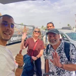 Ajay family smiling after their 10-day private Morocco tour with Moroccan Odyssey, leaving Morocco with souvenirs and happy memories