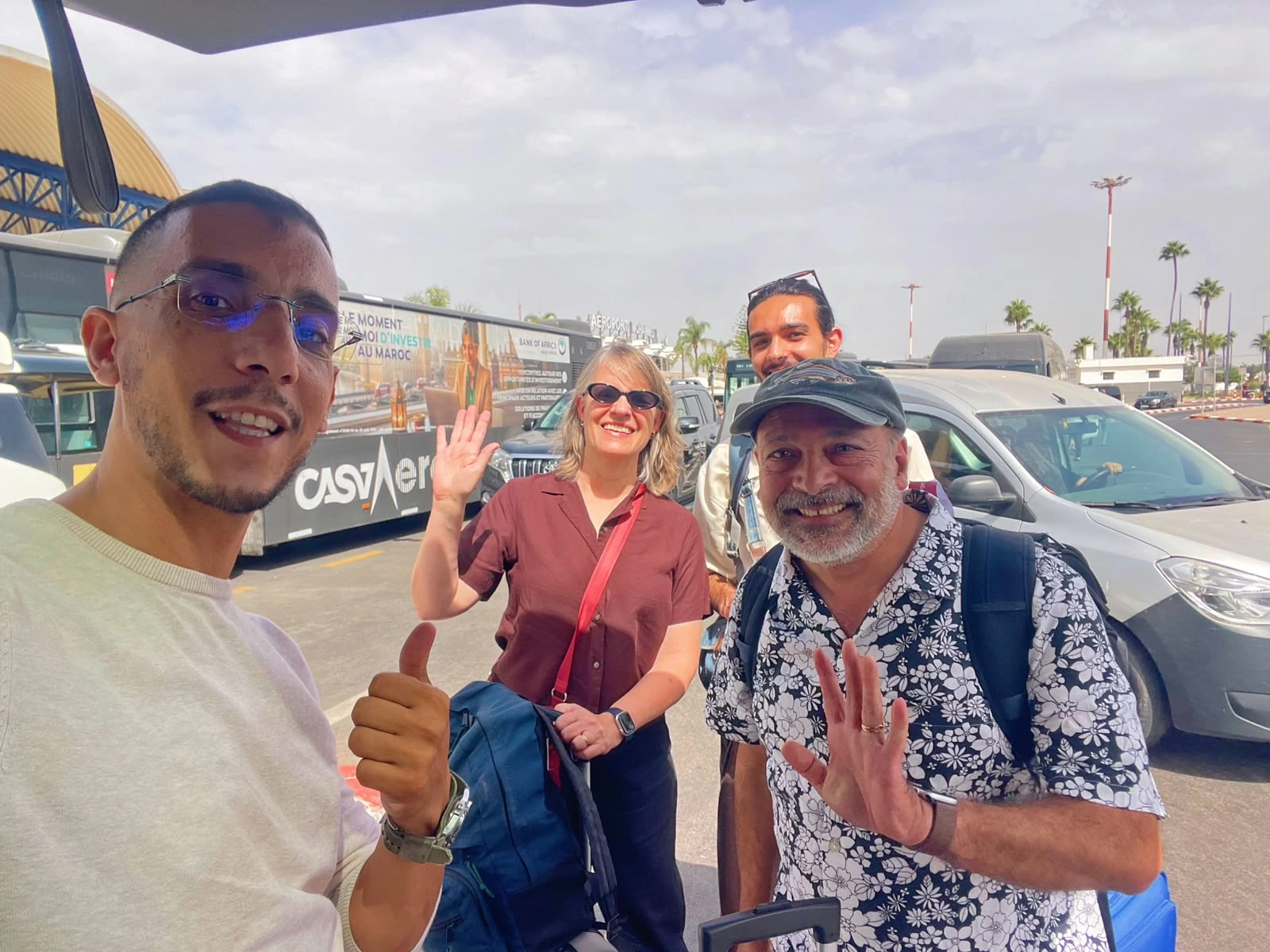 Ajay family smiling after their 10-day private Morocco tour with Moroccan Odyssey, leaving Morocco with souvenirs and happy memories