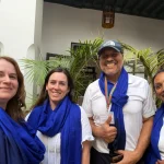 Moroccan Odyssey local guide with guests after a private walking tour in Marrakech, Morocco.